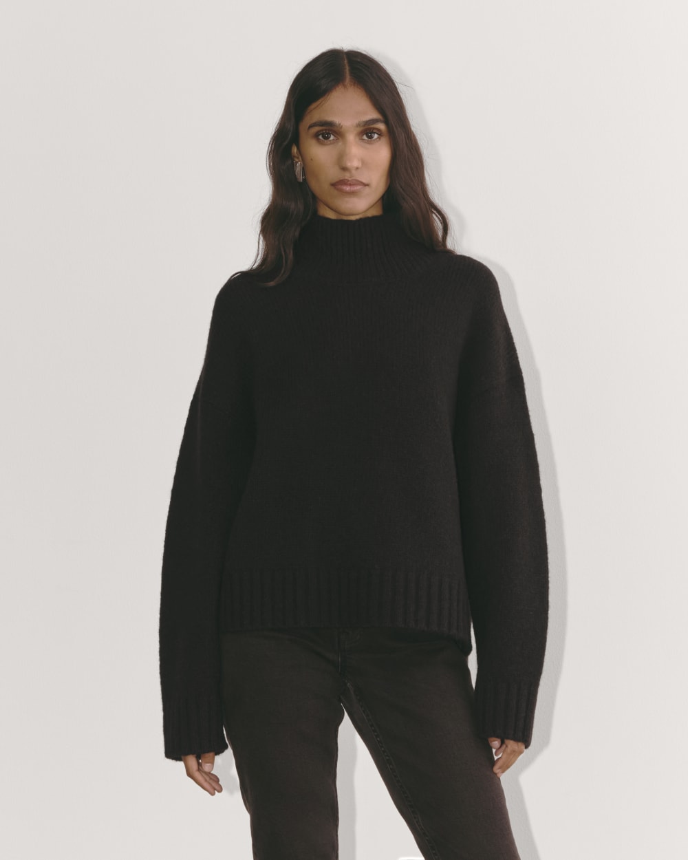 The Cloud Oversized Turtleneck in Black — front view