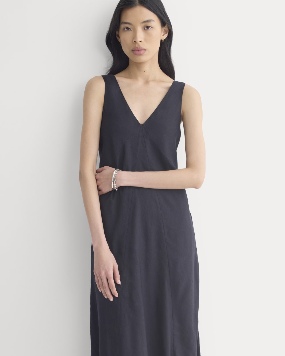 Deep V Seamed Dress in Stretch Linen in Black — detail view
