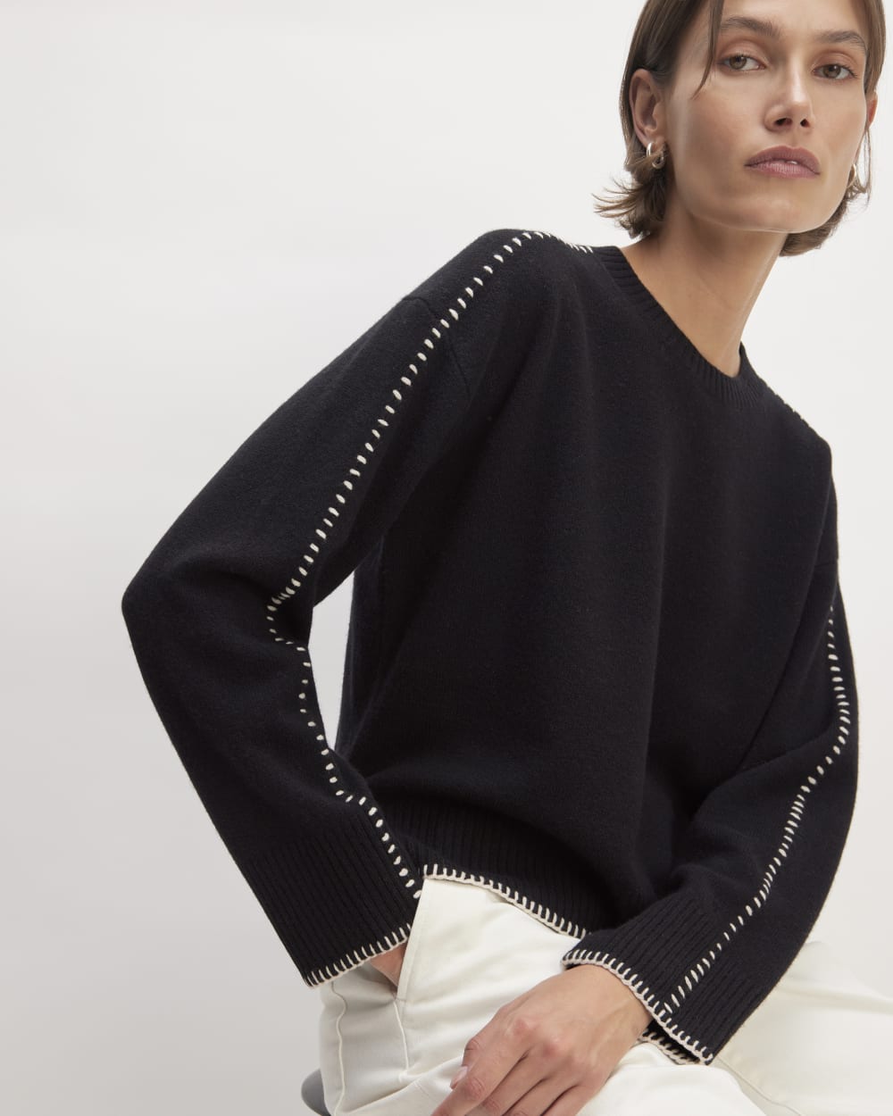The Good Merino Wool Crewneck Sweater in Black / Buttermilk — detail view