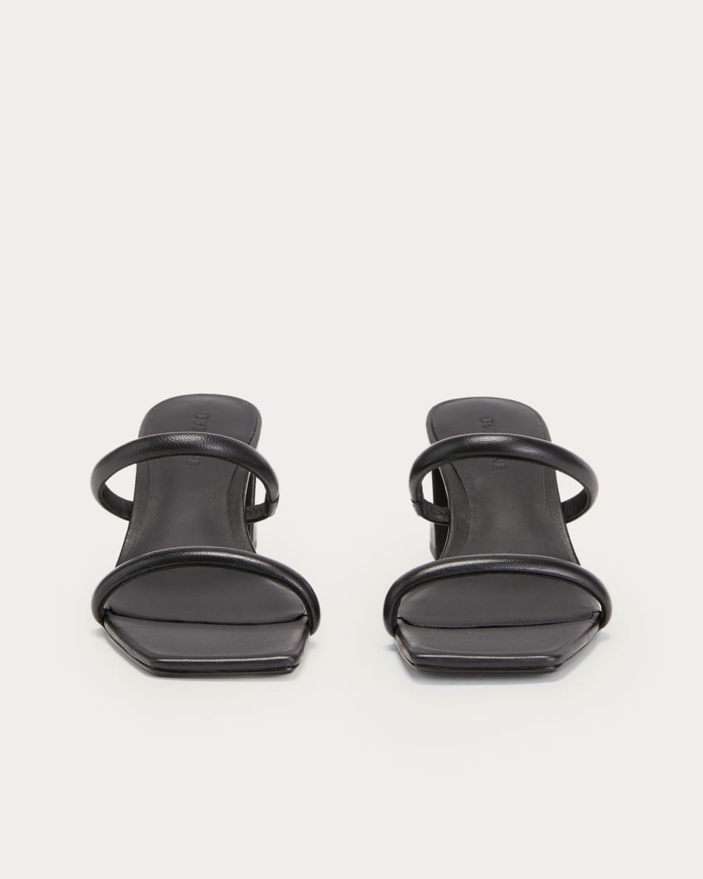 The Double Strap Heel in Black — detail view