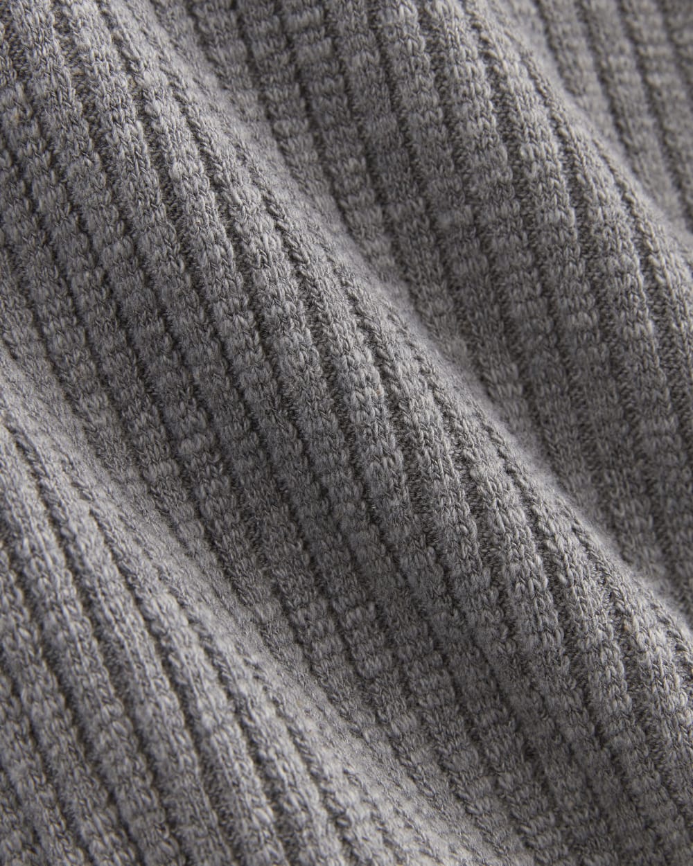 The Rib-Knit Short-Sleeve Henley in Mid Heather Grey — detail view