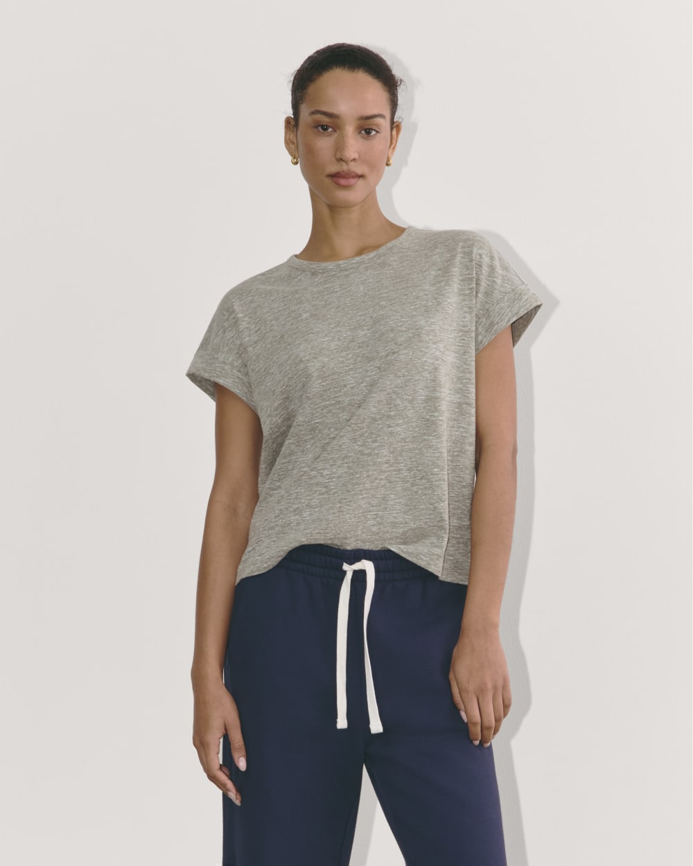 The Perform Tee in Heathered Grey / Olive — front view