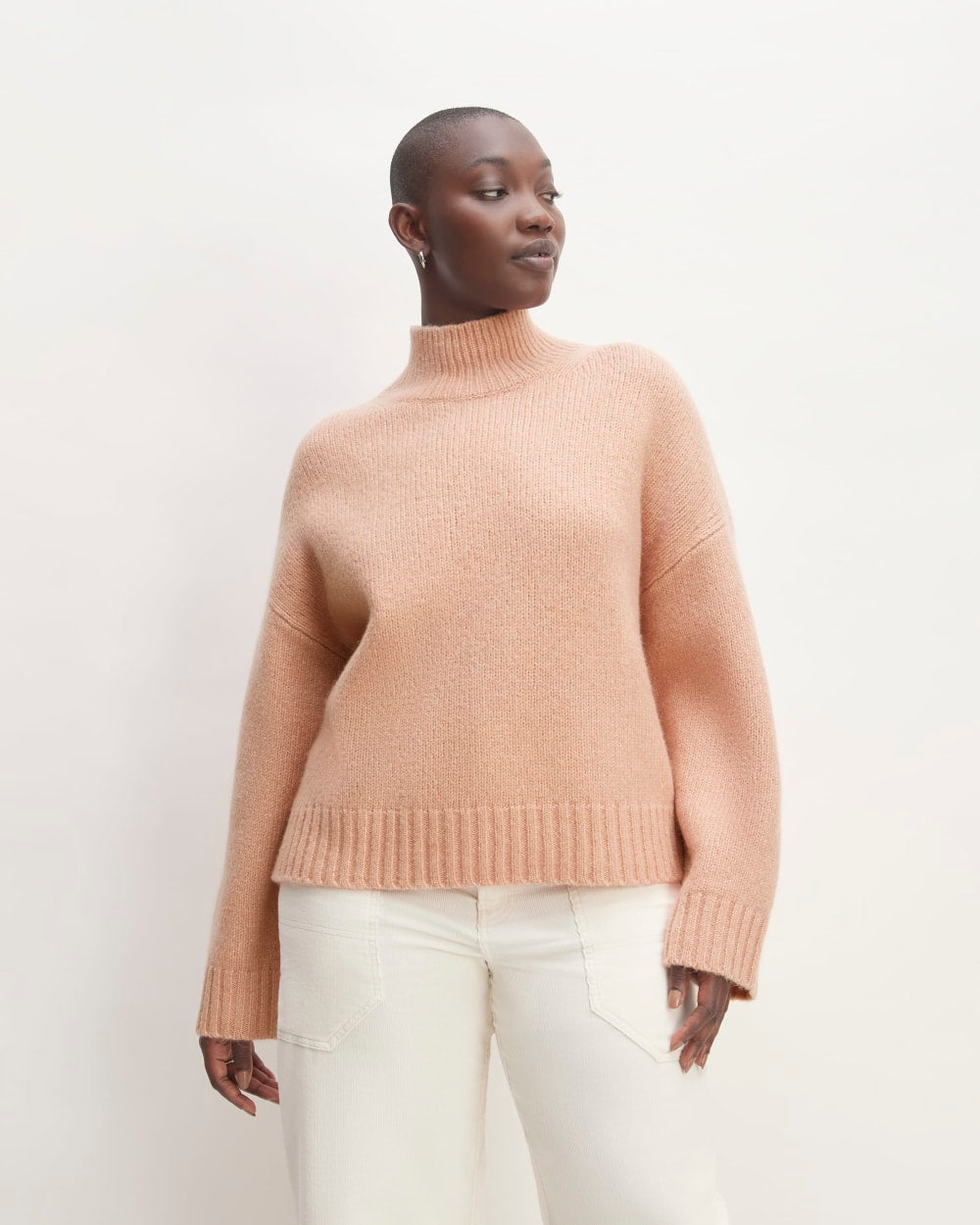 The Cloud Oversized Turtleneck in Blush Pink — front view