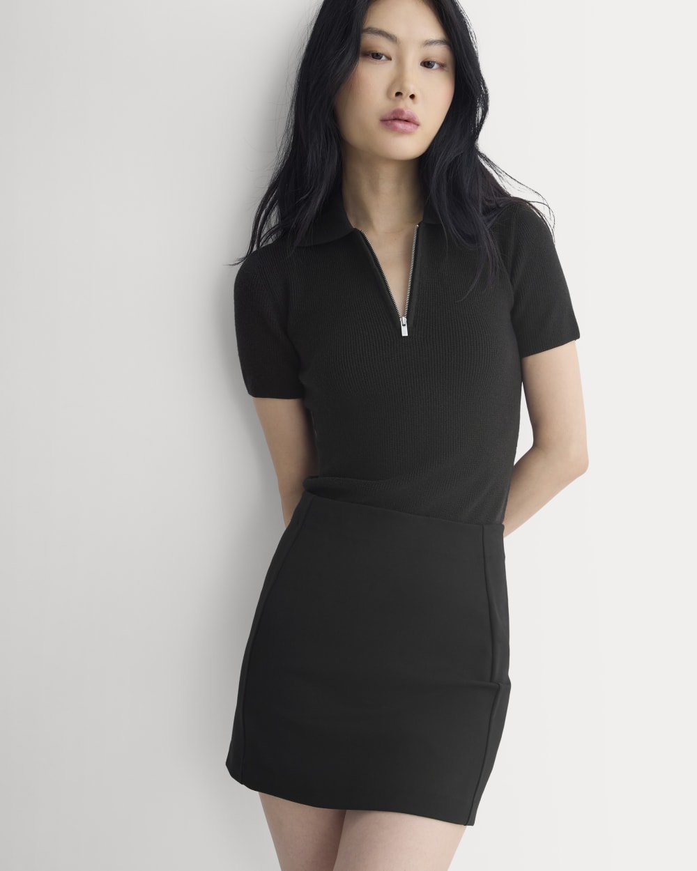 Knit Quarter-Zip Polo in Black — detail view