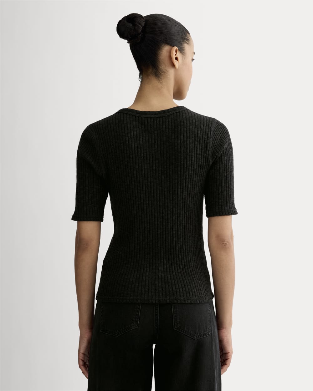 The Rib-Knit Short-Sleeve Henley in Black — detail view