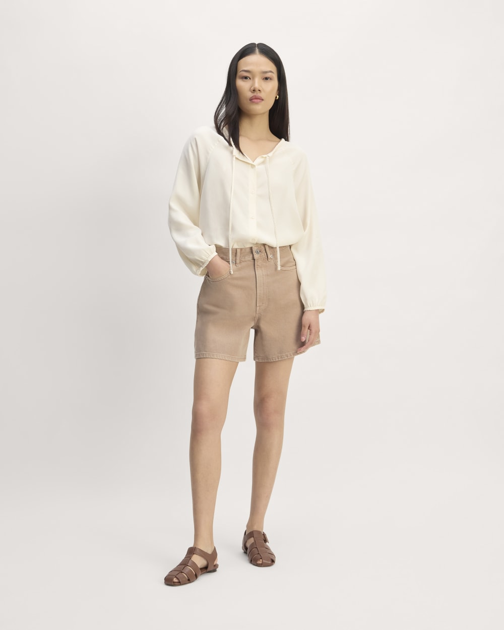The A-Line Denim Short in Neutral Chanterelle — front view