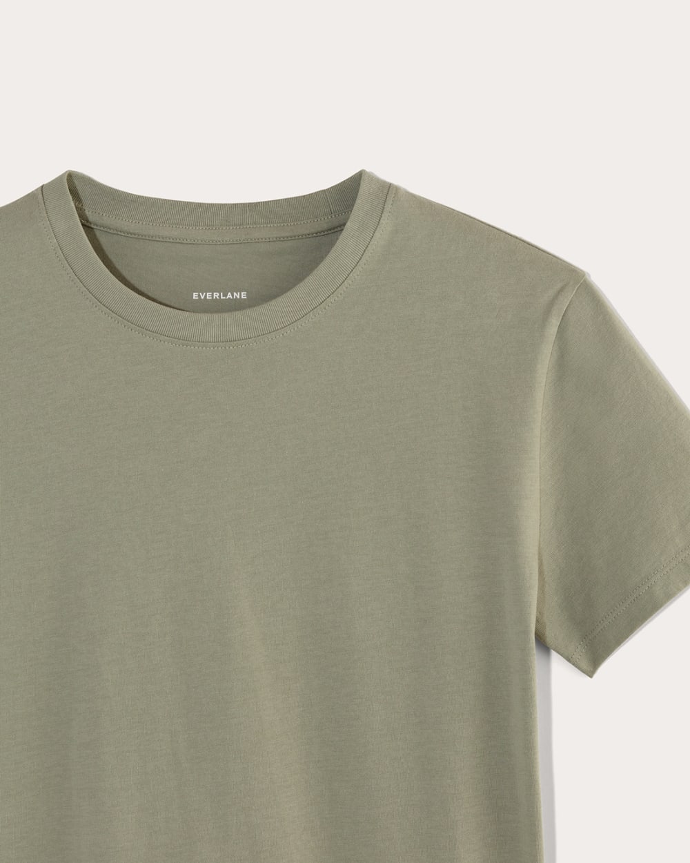 The Box-Cut Tee in Essential Cotton in Sage Green — detail view