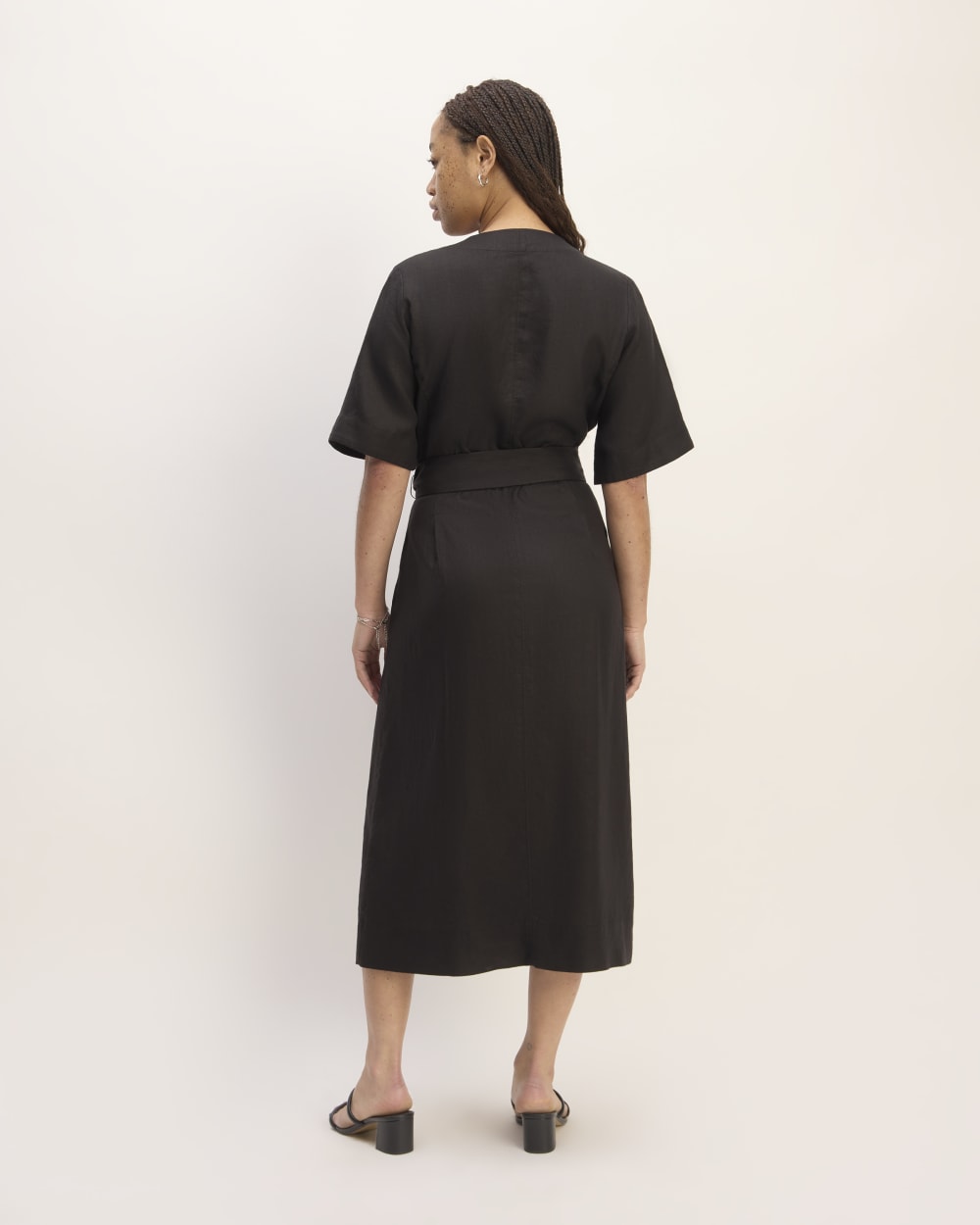The Wrap Dress in Linen in Black — detail view