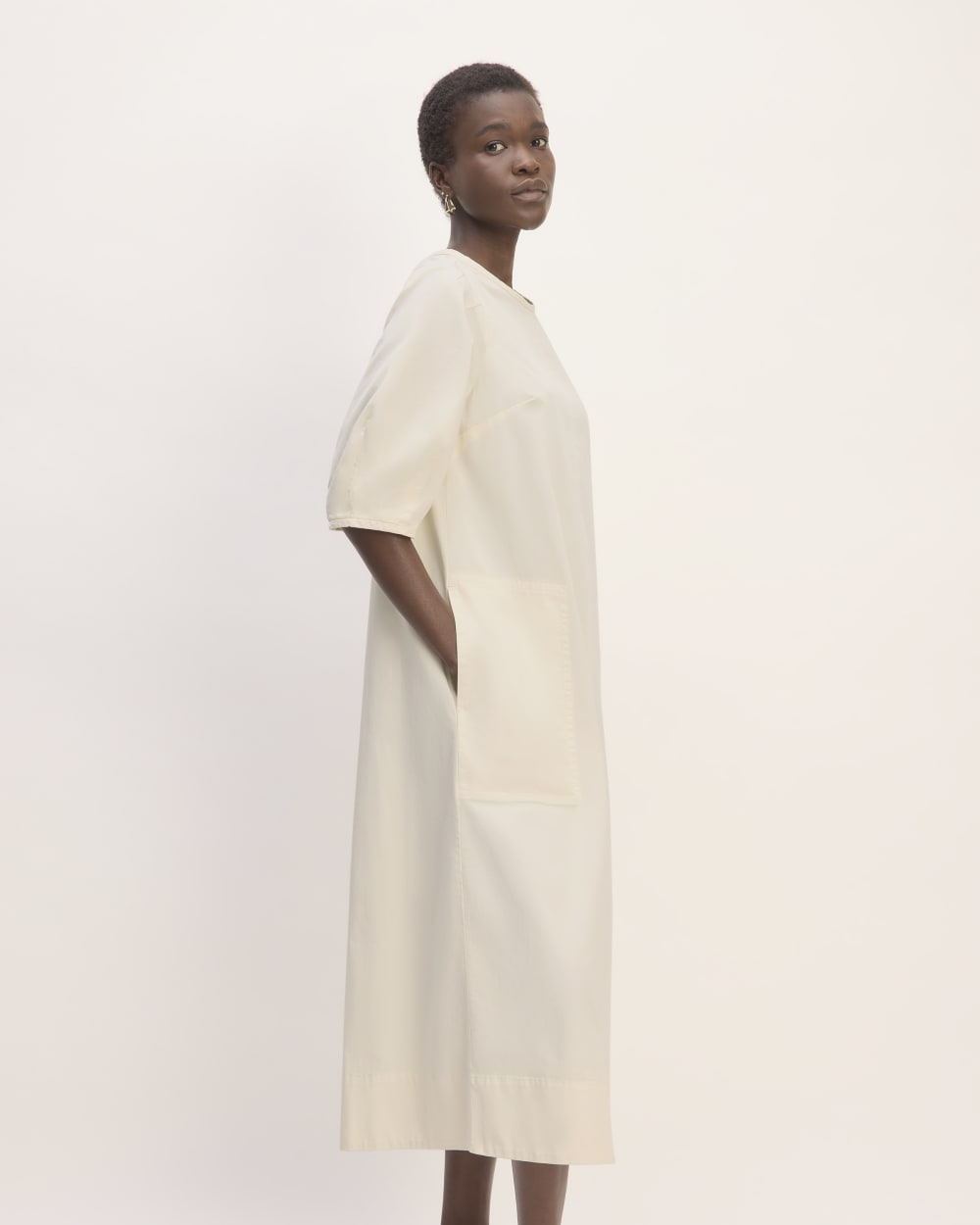 The Short-Sleeve Puff Midi Dress in Bone — detail view