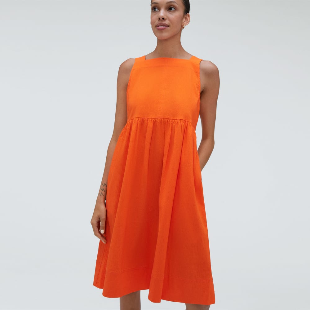 The Seersucker Midi Dress in Bright Orange — detail view