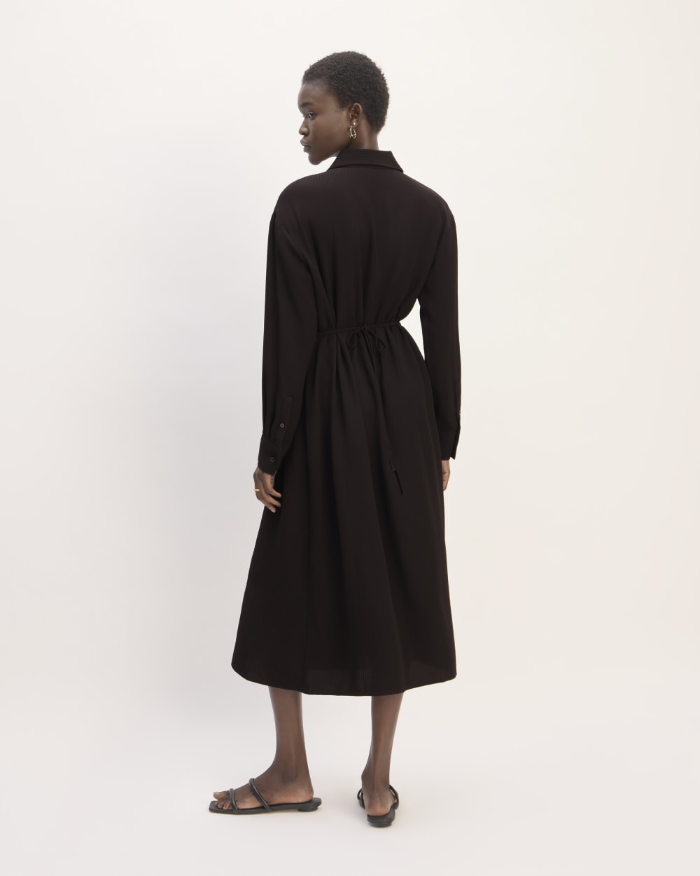 The Mini Jacquard Stripe Shirt Dress in Black — detail view