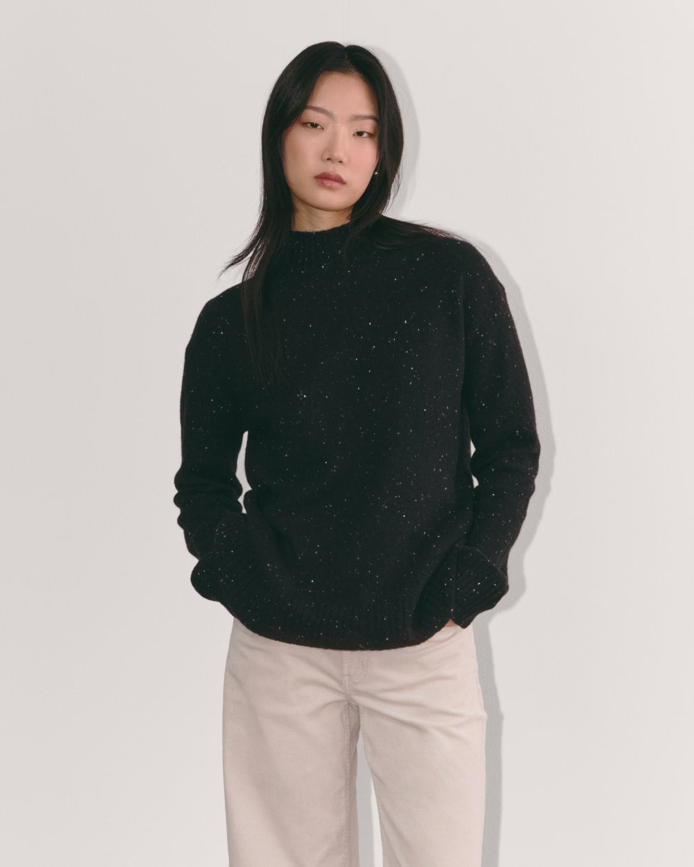 The Mockneck Sweater in Plush Cotton in Black Confetti — front view