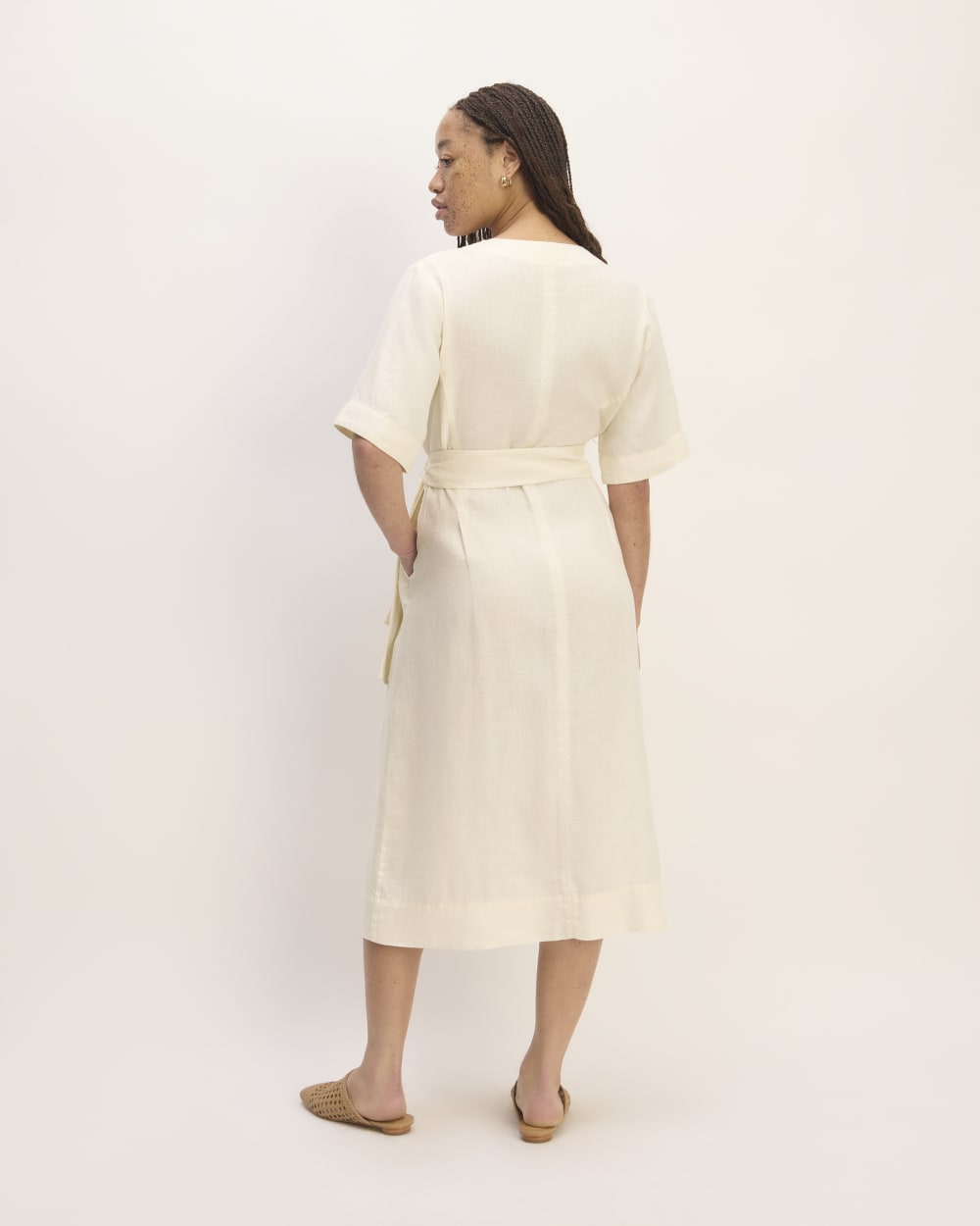 The Wrap Dress in Linen in Bone — detail view