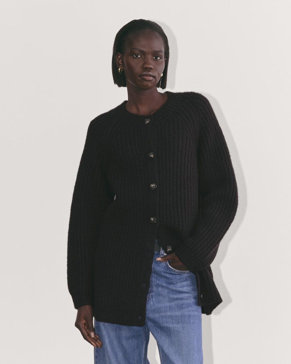 The Fisherman Cardigan in Cloud in Black — front view