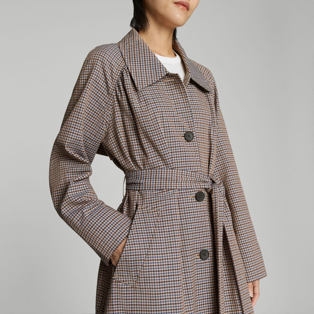 The Gathered Drape Trench in Blue / Brown Houndstooth — detail view