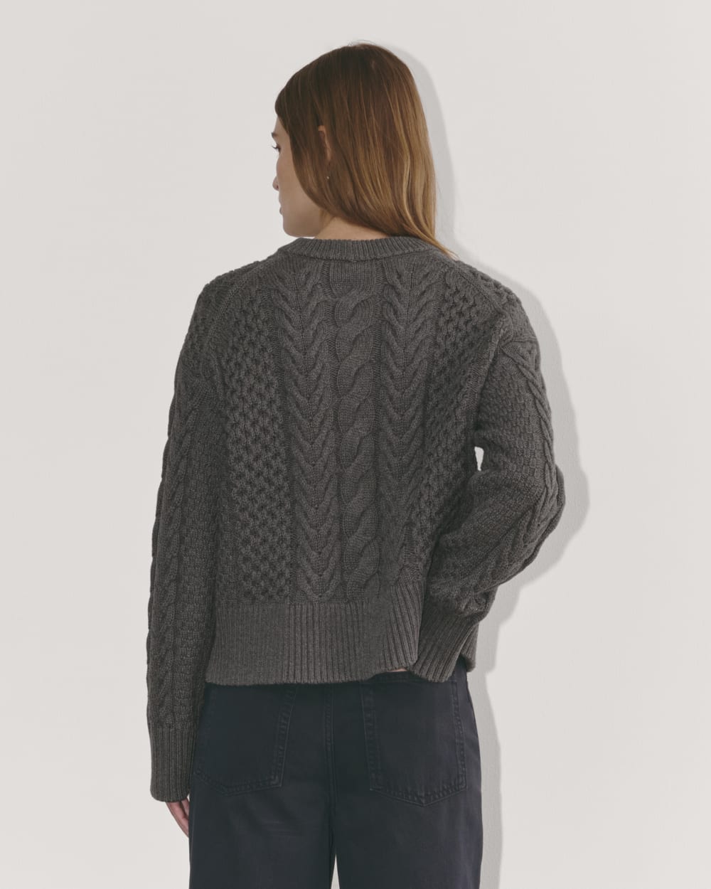 The Cable Sweater in Everyday Cotton in Heathered Charcoal — detail view