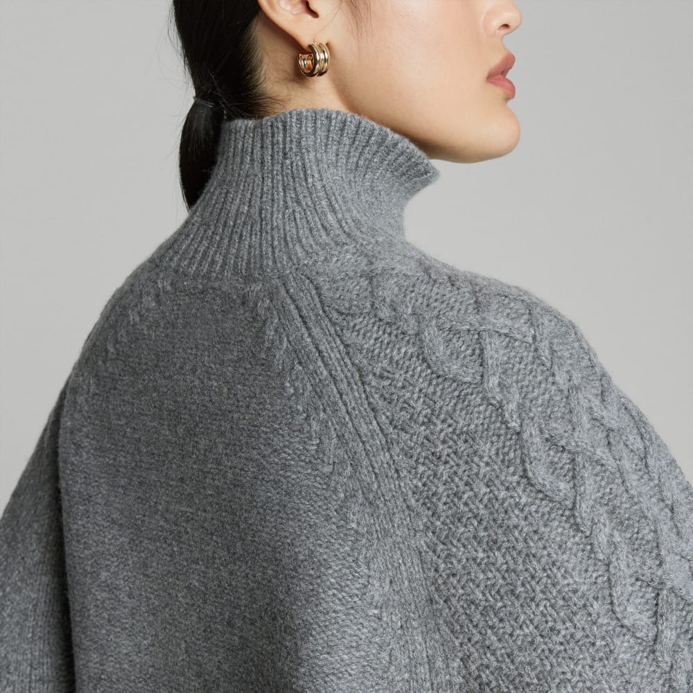 The Felted Merino Cable Sweater in Heathered Mid-Grey — detail view