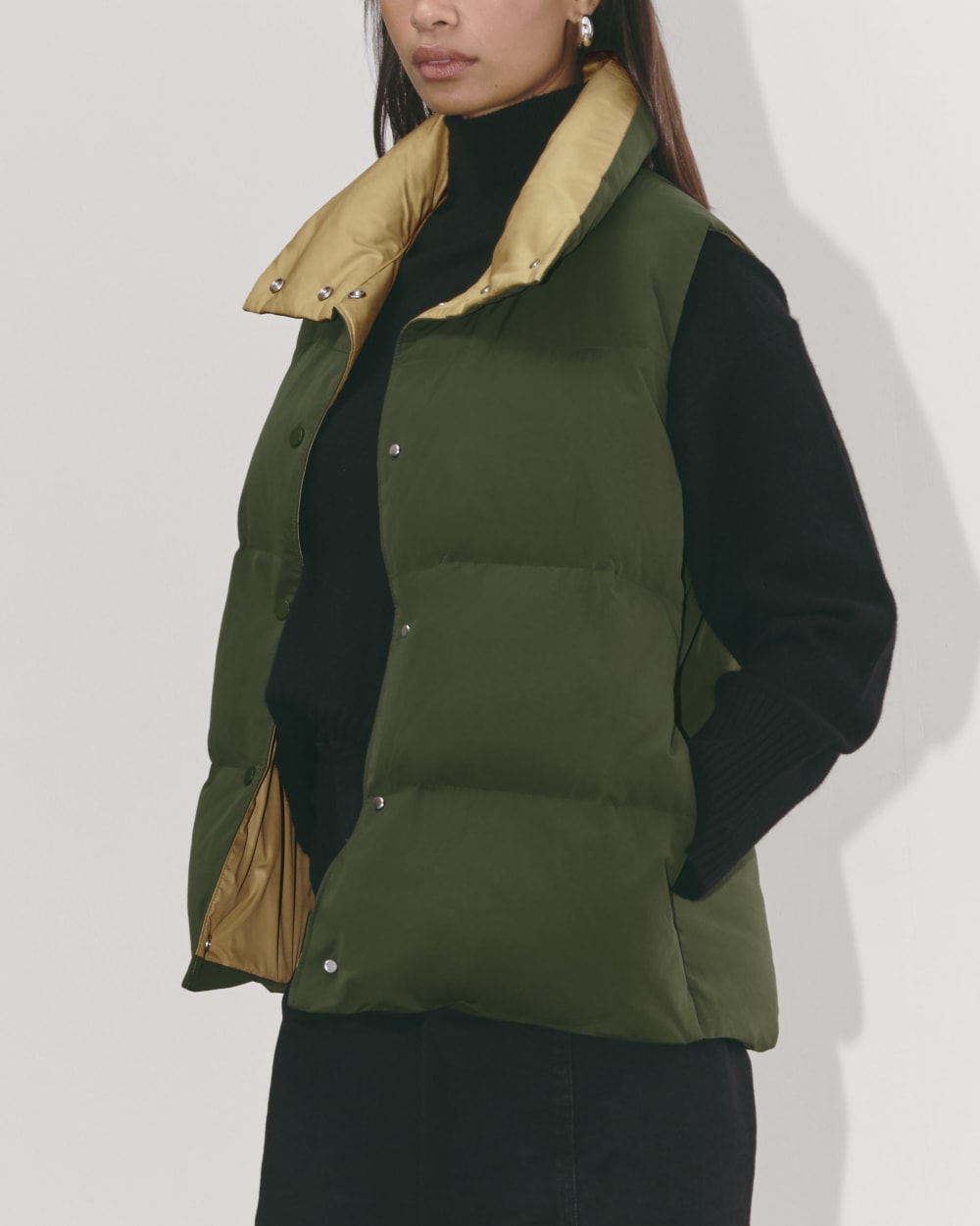 The Puffer Vest in Dark Forest — detail view