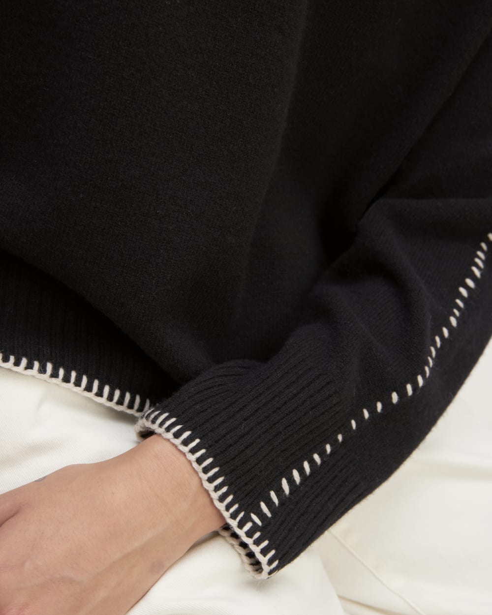 The Good Merino Wool Crewneck Sweater in Black / Buttermilk — detail view