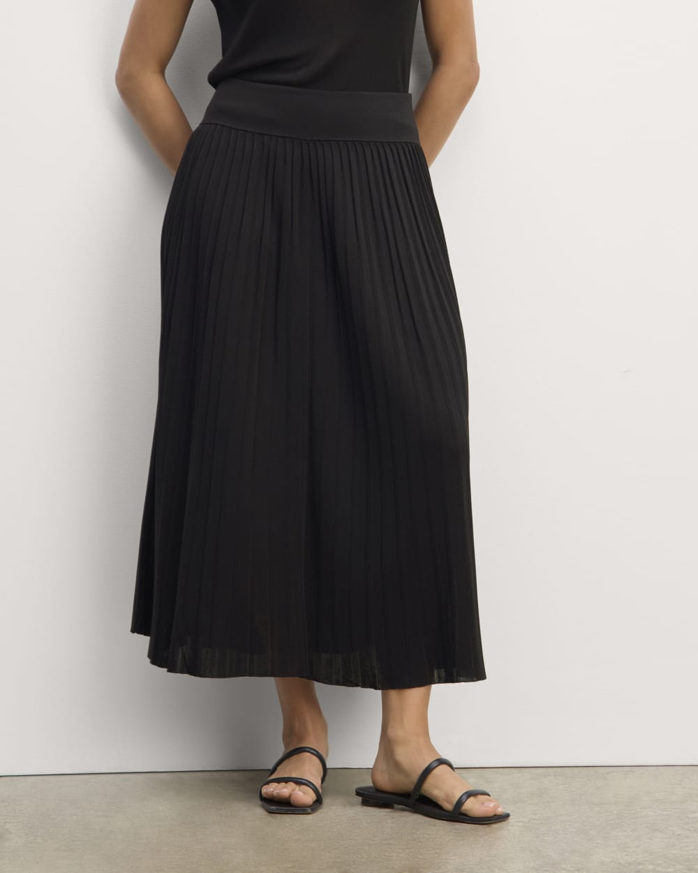 The Pleated Skirt in Black — detail view