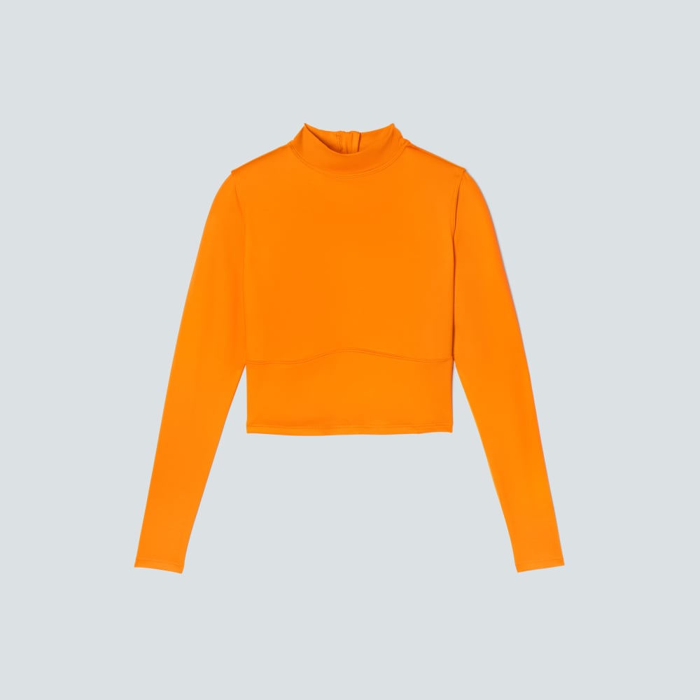 The Long Sleeve Rash Guard in Turmeric — front view