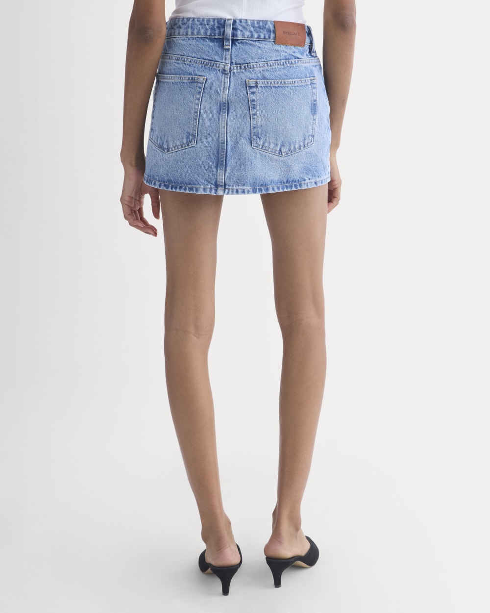 Everlane x Elena Bonvicini Thalia Mini Skirt in Crystal Cove Indigo — detail view