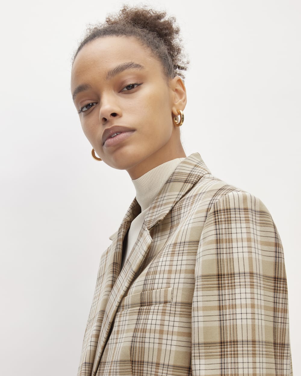 The Oversized Blazer in Buttersmooth in Pale Khaki Plaid — detail view