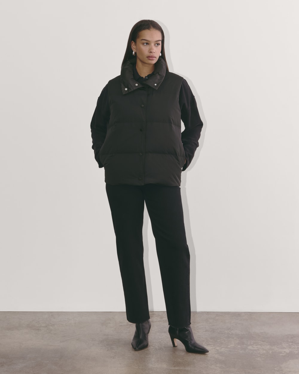 The Puffer Vest in Black — detail view