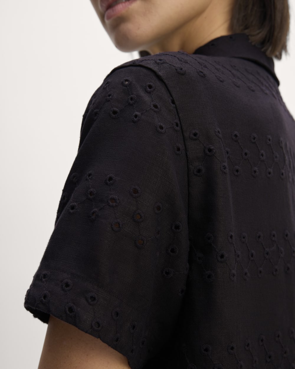 The Linen Eyelet Shirtdress in Black Eyelet — detail view
