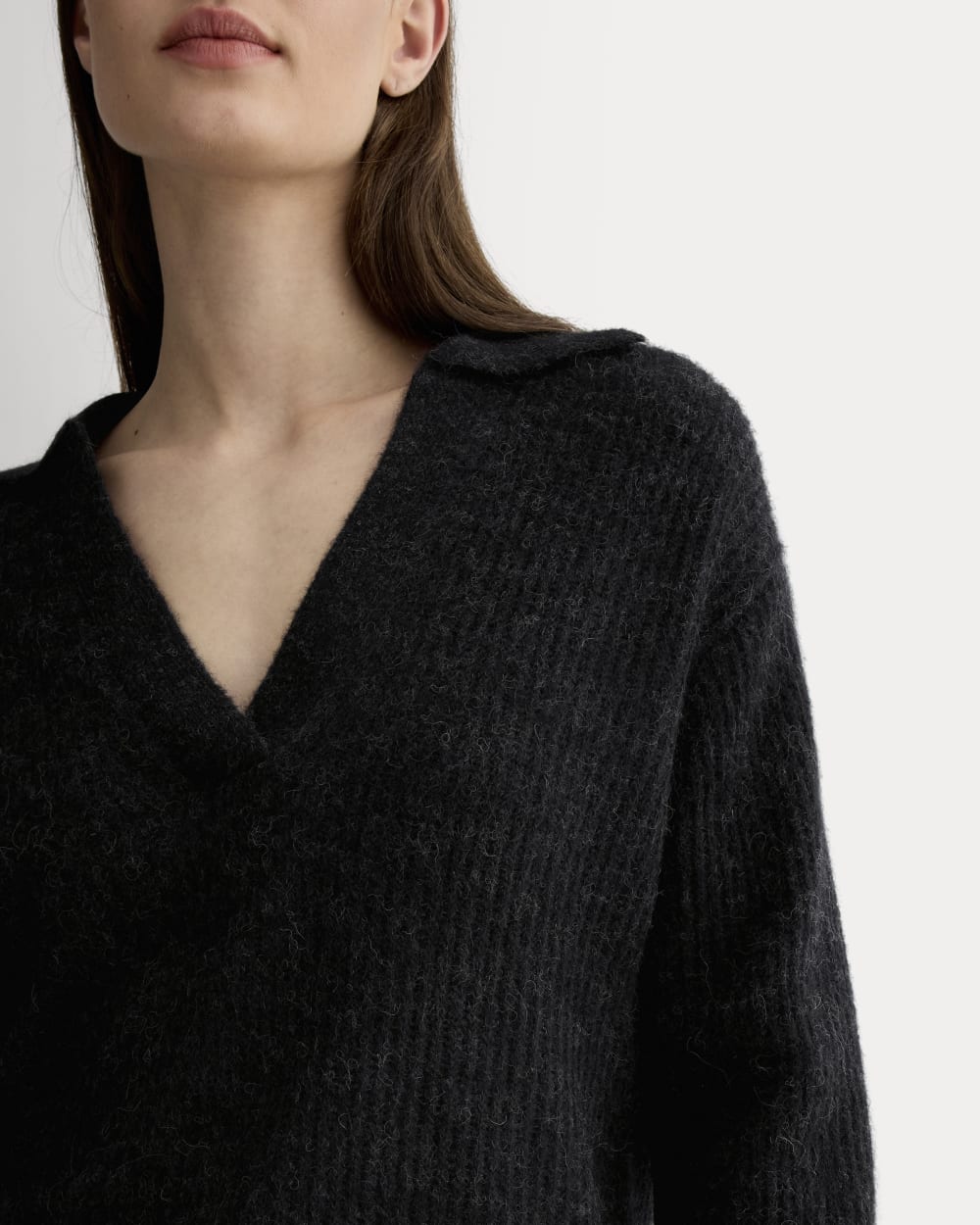 The Oversized Polo in Alpaca in Heathered Black — detail view