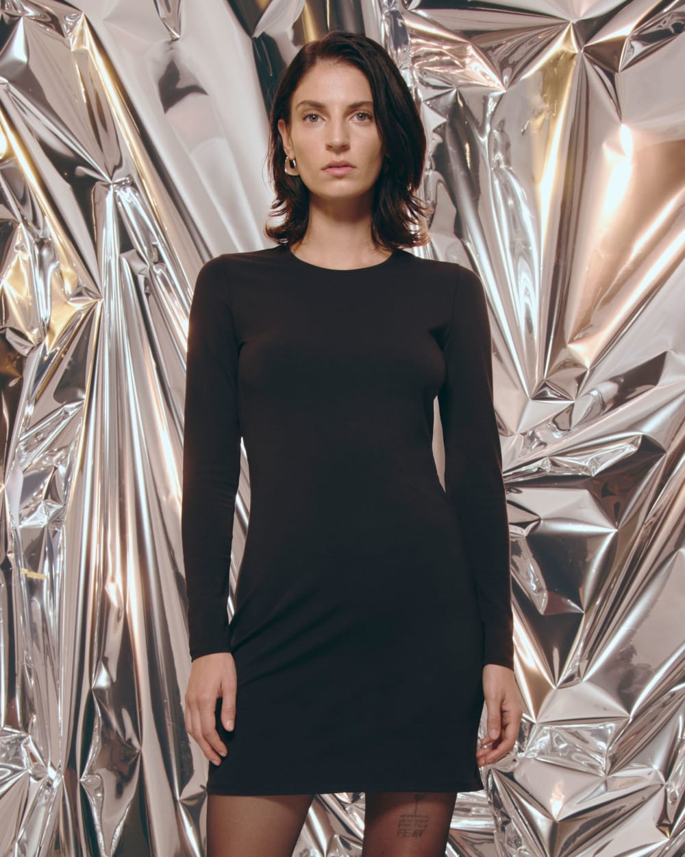 The Form Mini Dress in Black — detail view
