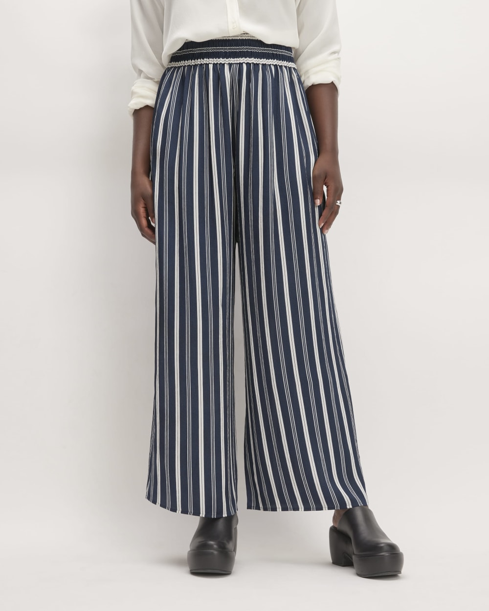 The Satin Pull-On Pant in Navy / Bone — front view