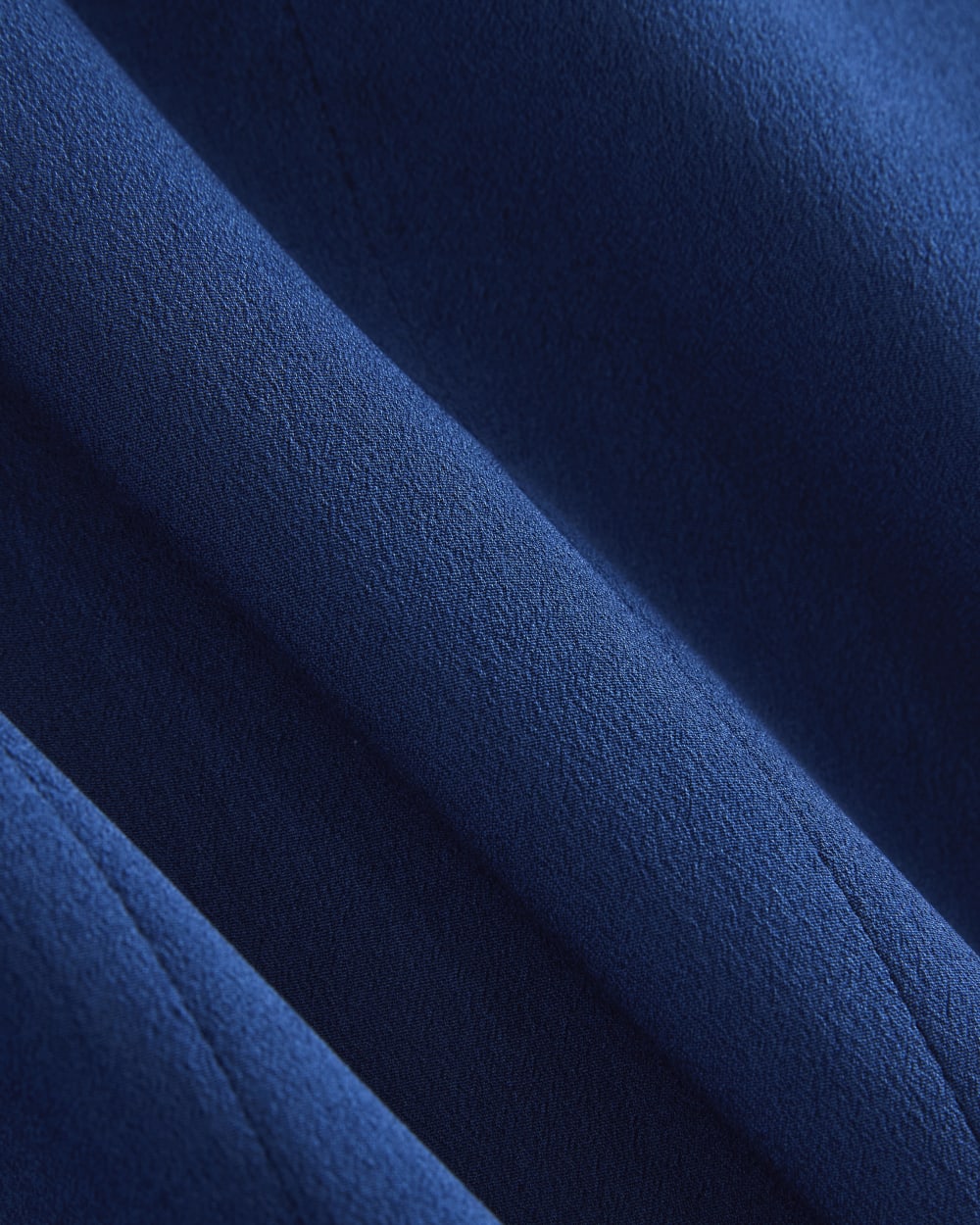 Sleeveless Peplum Top in Estate Blue — detail view