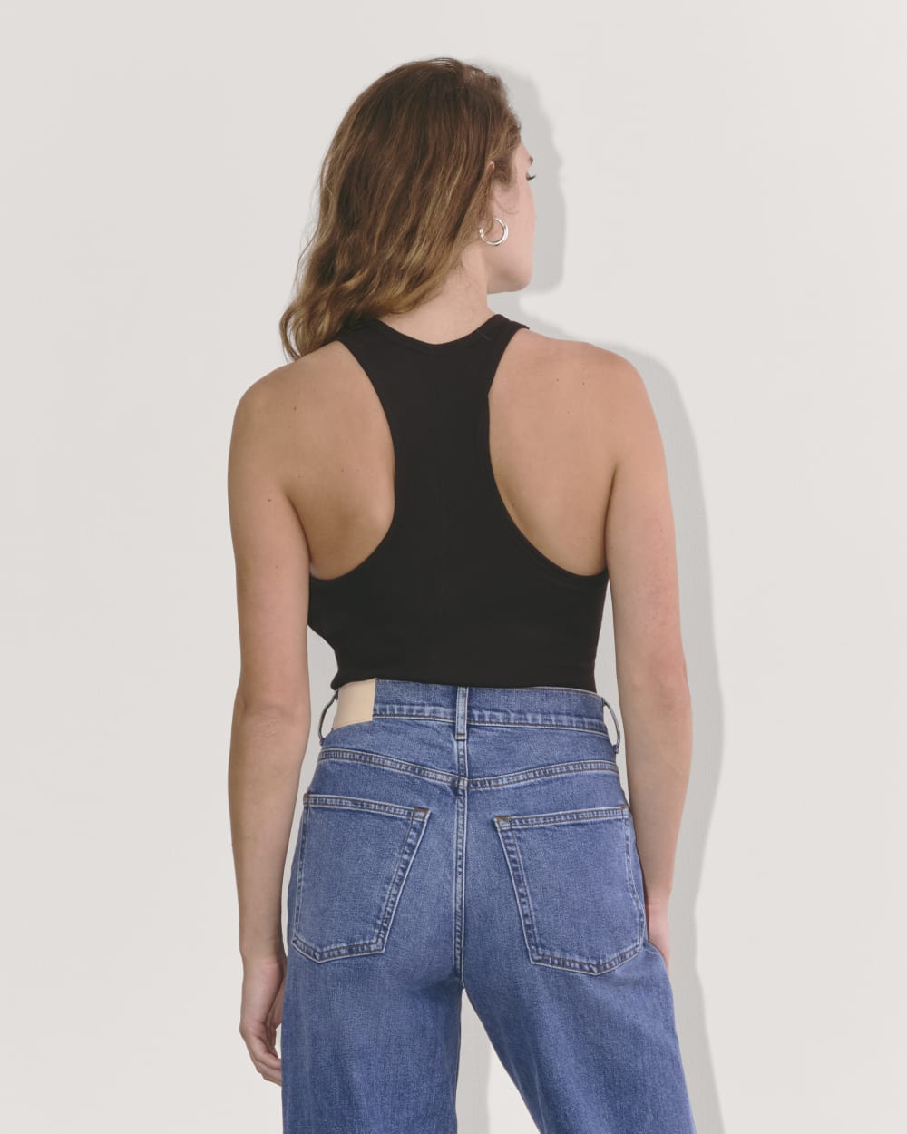 The Luxe Rib Racerback Tank in Black — detail view