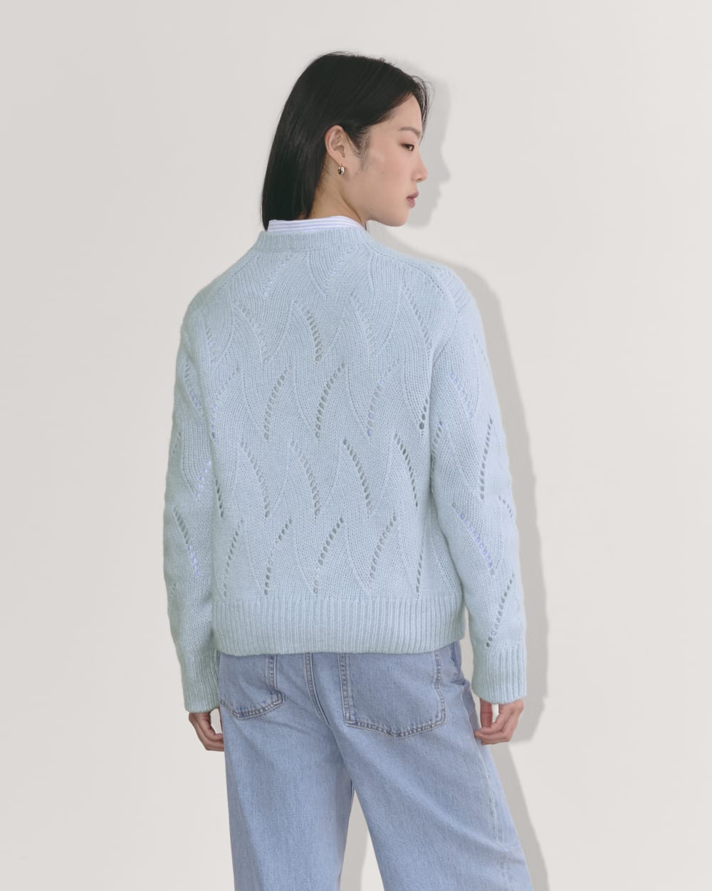 The Pointelle Sweater in Cloud in Chambray Blue — detail view