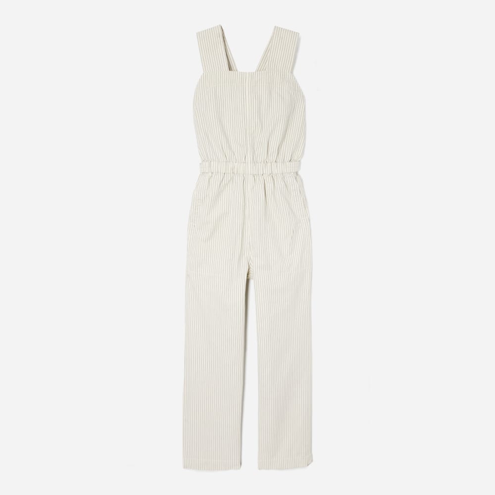 The Fatigue Apron Jumpsuit in Navy Stripe — front view