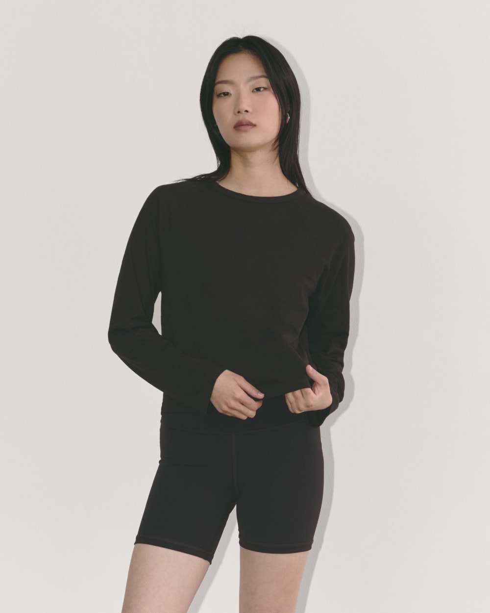 The Perform Crew Tee in Black — front view