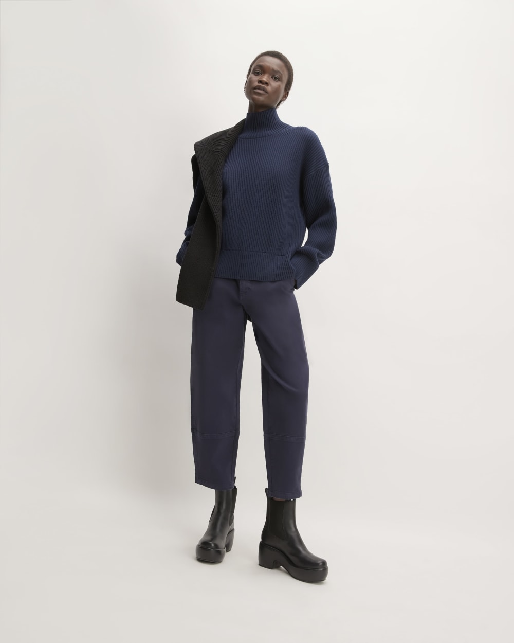 The Organic Cotton Ribbed Turtleneck in Navy — detail view