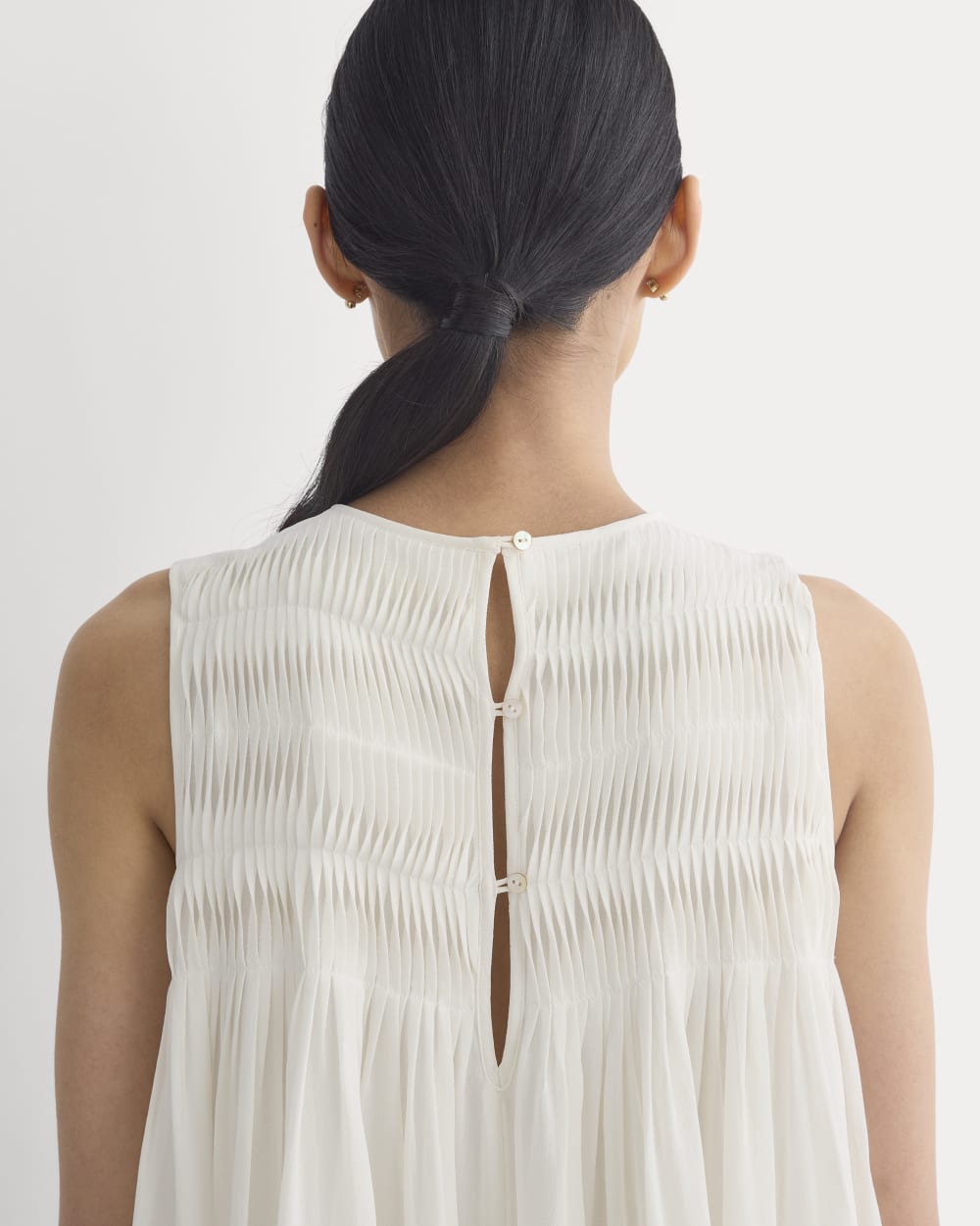 Twisted Pleated Mini Dress in Silk Georgette in Bone — detail view