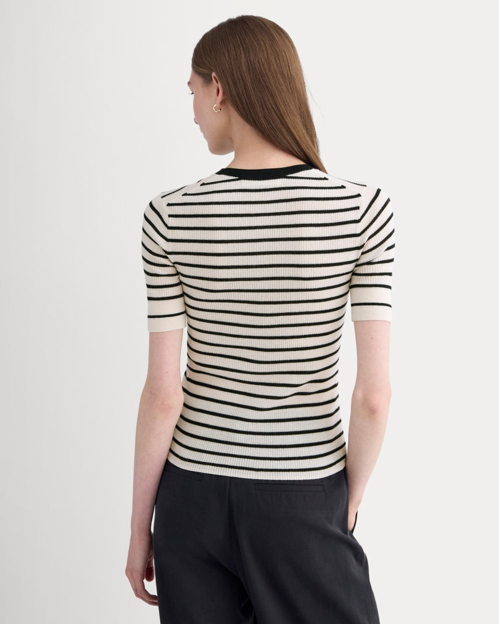The Short-Sleeve Henley in Ultrasoft Merino in Parchment / Black — detail view