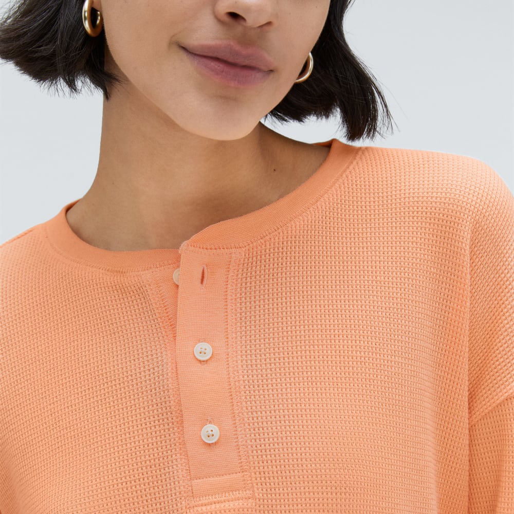 The Organic Cotton Waffle Henley in Orange Chiffon — detail view