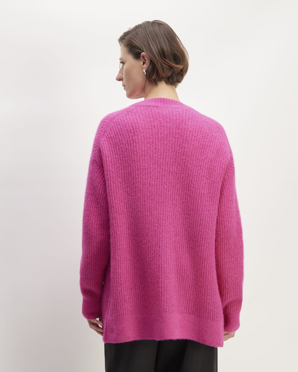 The Alpaca Oversized Cardigan in Fuchsia Pink — detail view