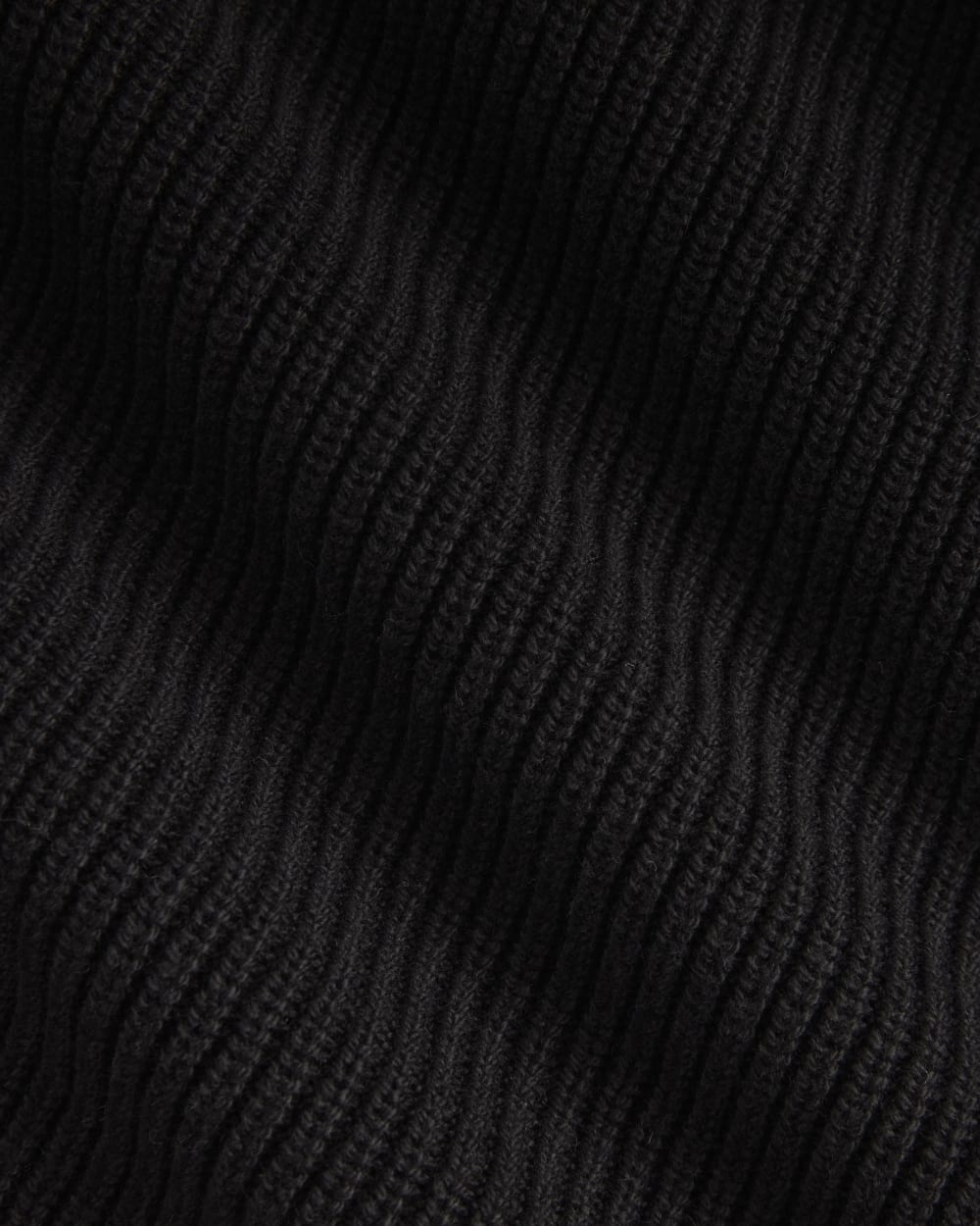 The Slouchy V-Neck in Everyday Cotton in Black — detail view