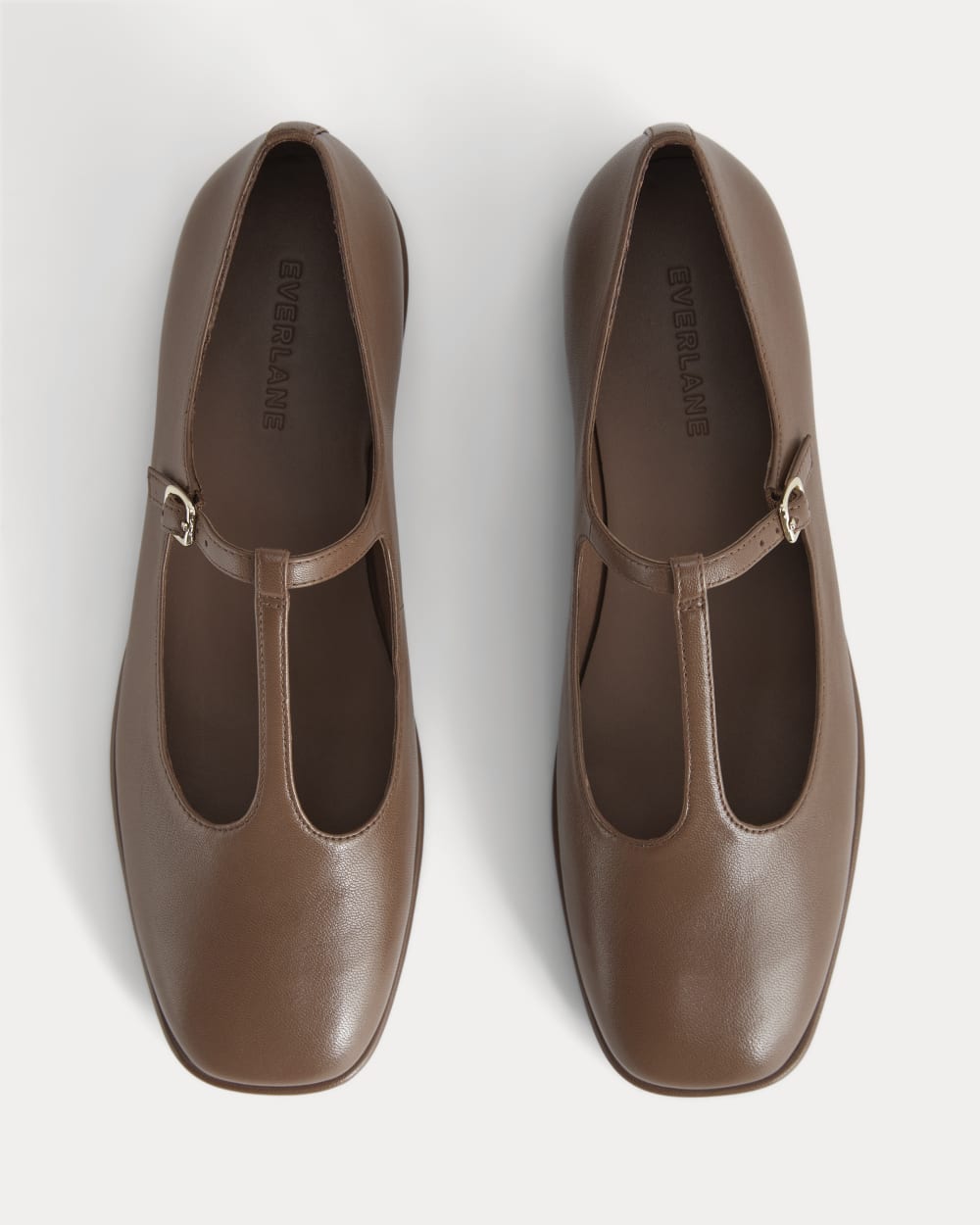 The Leather T-Strap Flat in Rum — detail view