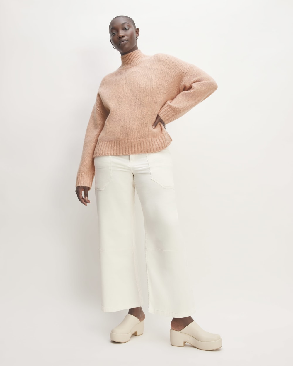 The Cloud Oversized Turtleneck in Blush Pink — detail view