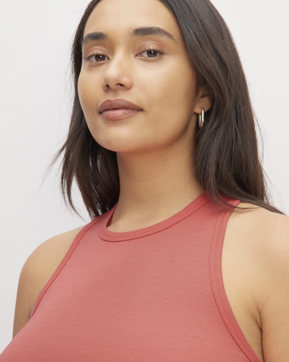 The Luxe Rib Racerback Tank in Coral — detail view