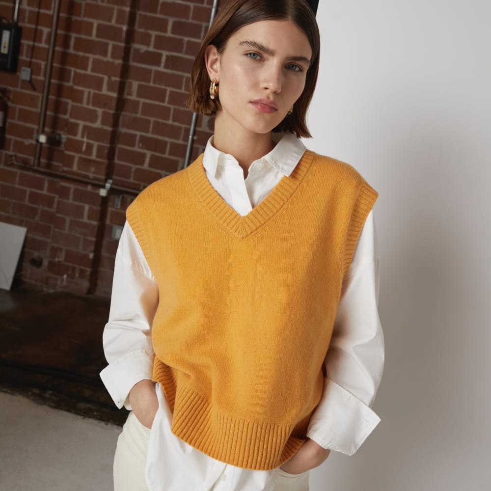 The Cashmere Vest in Kumquat — detail view
