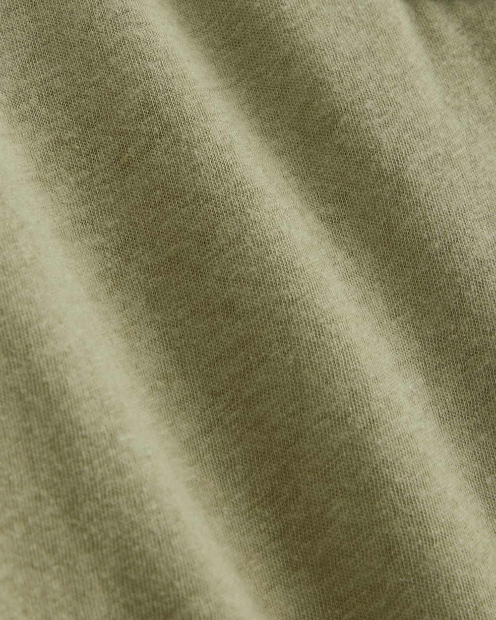 The Henley in Cotton Linen in Eucalyptus — detail view