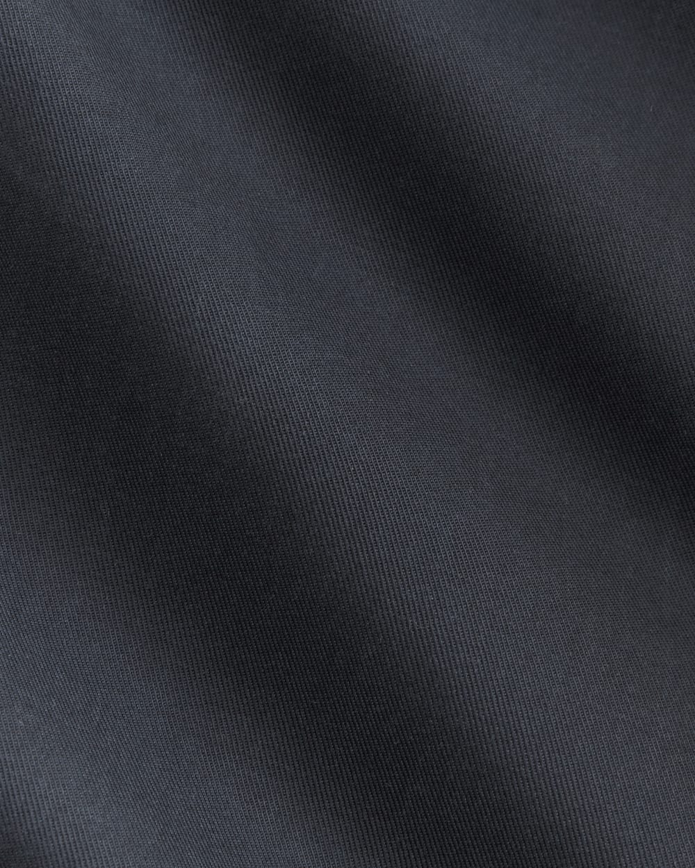 The Draper Pleated Pant in Buttersmooth in Navy — detail view