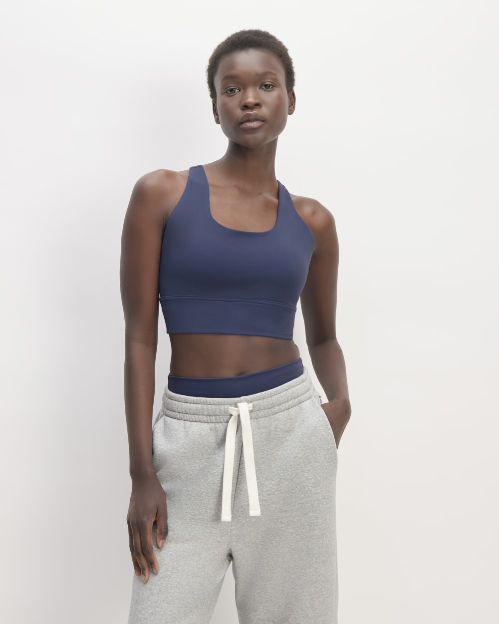The Perform Longline Bra in Ocean Blue — front view
